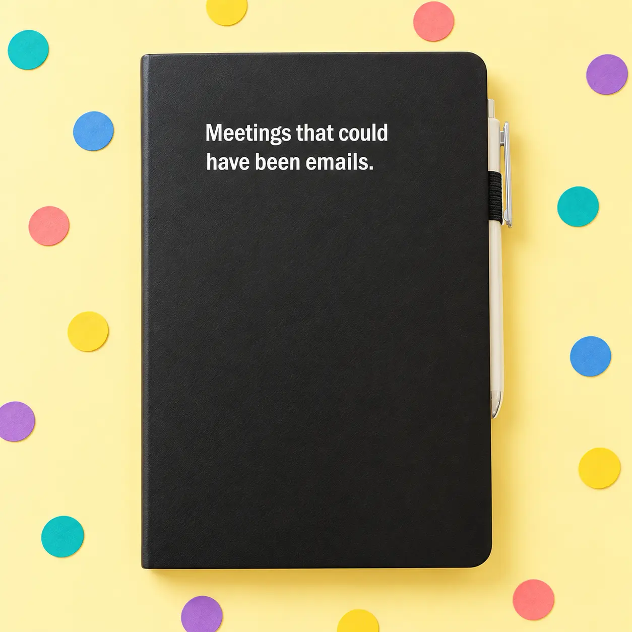 Black notebook reading Meetings that could have been emails