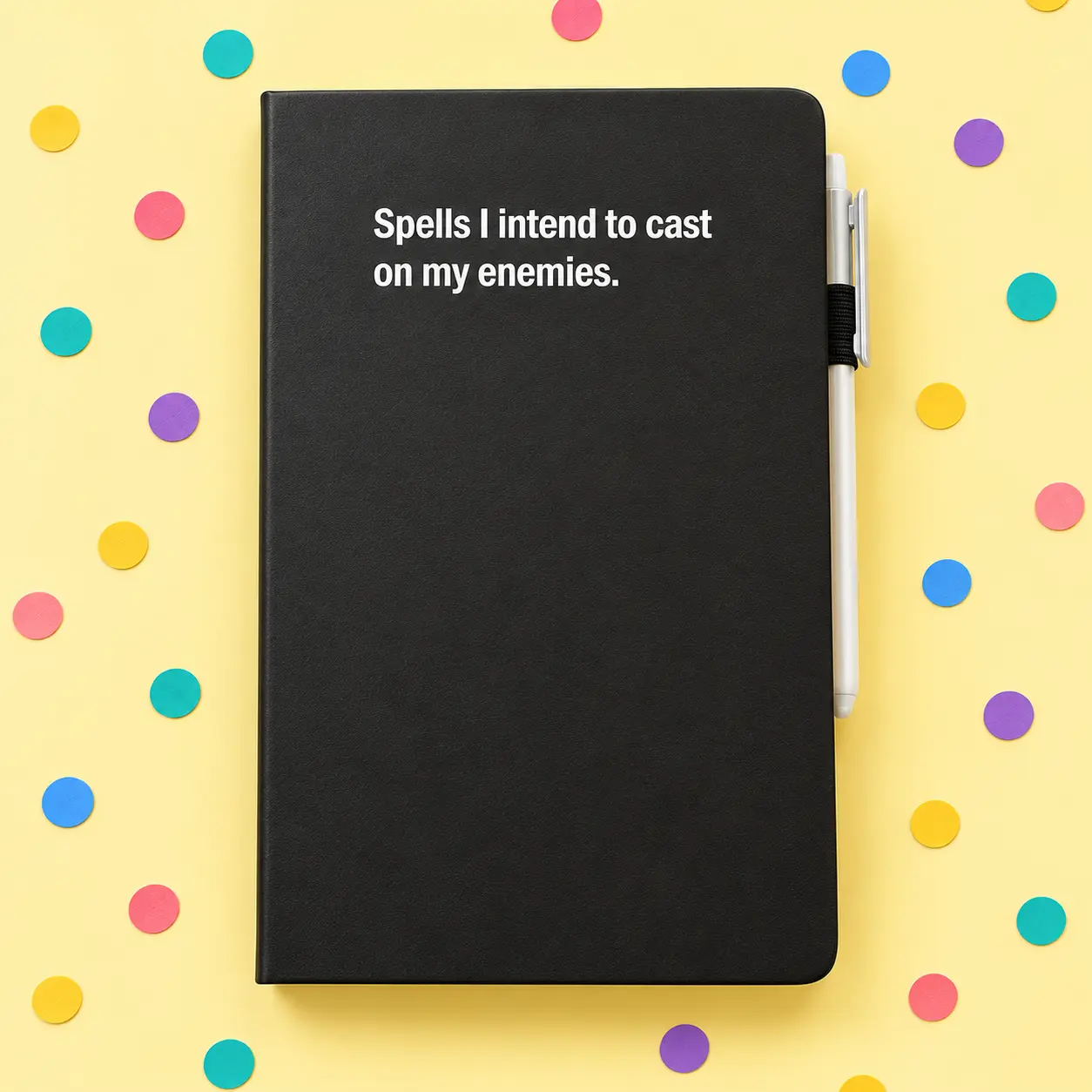 Black notebook reading Spells I intend to cast on my enemies